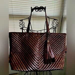 Metallic pink Victoria’s Secret tote.